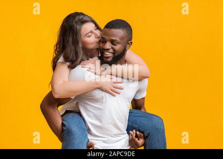 Interracial Couple In Love Having Romantic Moments Together Stock Photo