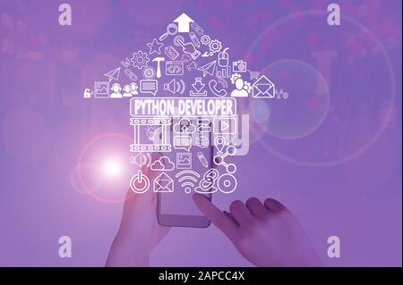 Text sign showing Python Developer. Business photo showcasing responsible for writing serverside web application logic Stock Photo