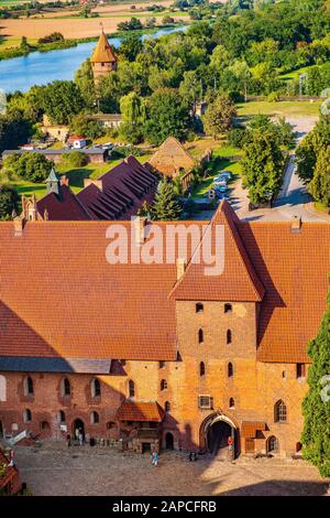 Malbork, Pomerania / Poland - 2019/08/24: Aerial panoramic view of the inner courtyard of the Middle Castle part of the medieval Teutonic Order castle Stock Photo
