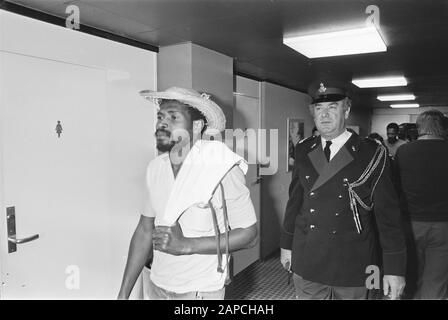 Arrival opponents of Bouterse who have been expelled by French Guyana; one of the deported Surinamese Dutch Date: March 27, 1984 Location: Suriname Keywords: arrivals Opponents Personal Name: Bouterse, French Guyana Stock Photo