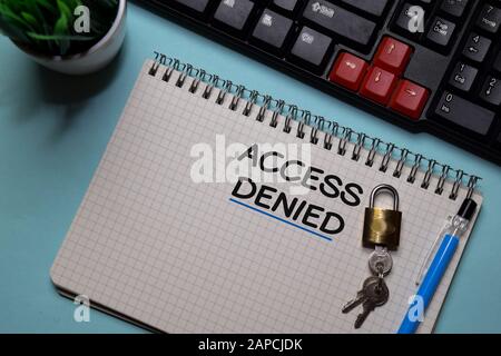 Access Denied write on a book isolated on office desk. Stock Photo