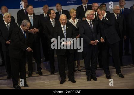 Israeli Prim e Minister Benjamin Netanyahu points to a spot for France's Emmanuel Macron, as some 40 heads of state try to organize themselves to pose for a group photograph following a dinner reception.at Israel's President Reuven Rivlin's official residence in Jerusalem on Wednesday, January 22, 2020. The leaders are in Israel for the 5th World Holocaust Forum at the Yad Vashem Holocaust memorial and museum in Jerusalem, which begins on Thursday, January 23. This year's forum marks 75 years since the liberation of the Auscwitz-Birkenau death camp in 1945. Pool Photo by Heidi Levine/UP Stock Photo