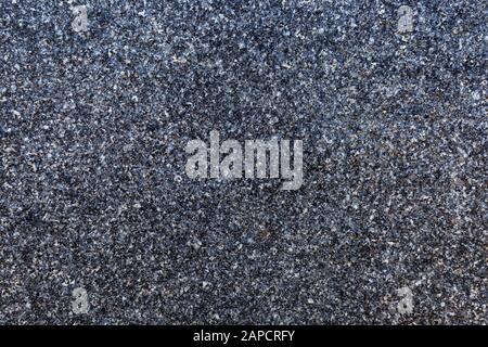 Close-up of natural granite stone. Abstract full frame textured background. Stock Photo