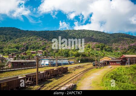Train Station in Paranapiacaba, Sao Paulo, Brazil. Old Railway Carriages And Railroad In Historical English Village Among Tropical Green Mountains. Stock Photo