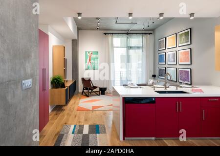 View from kitchen to living space in modern apartment design Stock Photo