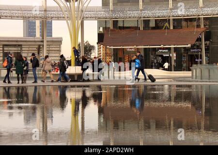 Tourists in Porta Nuova shopping center, Milan. Stock Photo