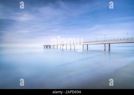 Pier or jetty, beach and sea in Marina di Pietrasanta. Versilia Lucca Tuscany Italy Stock Photo