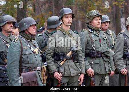 Vorzel, Ukraine - November 03, 2019: Men in the form of Wehrmacht soldiers at the festival of historical reconstruction Stock Photo