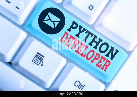 Handwriting text Python Developer. Conceptual photo responsible for writing serverside web application logic Stock Photo