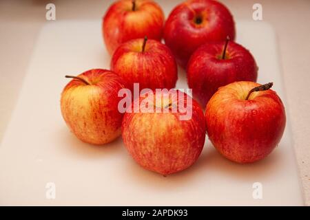 beautiful cruchy looking freshly washed apples in the kitchen Stock Photo