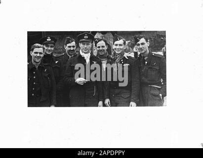 The crew of the Halifax S. for Sugar. In the middle the Dutch pilot responsible for sinking one of the three German U-boats during the General Chase Annotation: During the Second World War reserve first lieutenant pilot A. van Rossum after a secondment to the 320 squadron is assigned to Coastal Command. In the 502 squadron of the Royal Air Force (RAF), he flies in a Halifax bomber. During a patrol over the Atlantic Ocean in the fall of 1943, 3 German U-boats were discovered. In the attack, Lieutenant Van Rossum manages to sink a submarine with a direct hit. Van Rossum receives high military aw Stock Photo
