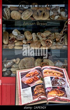 Bakery shop with assortment of bread on shelves Stock Photo - Alamy