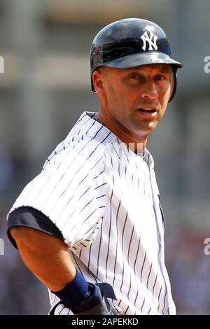 BRONX, NY - APR 14: New York Yankees shortstop Derek Jeter (2) stands on third base against the Los Angeles Angels on April 14, 2012 at Yankee Stadium. Stock Photo