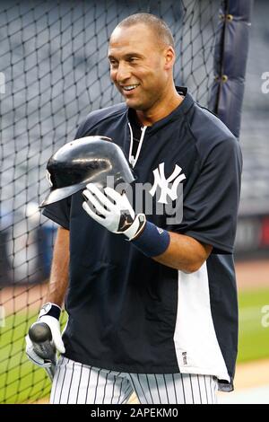 BRONX, NY - SEP 15: New York Yankees shortstop Derek Jeter hits an rbi  single against the Tampa Bay Rays on September 15, 2012 at Yankee Stadium  Stock Photo - Alamy