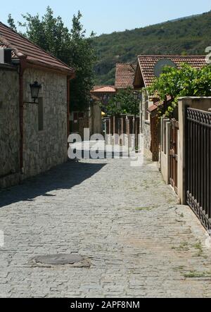 Back street with houses near Svetitskhoveli Cathedral, Mtskheta, Georgia Stock Photo