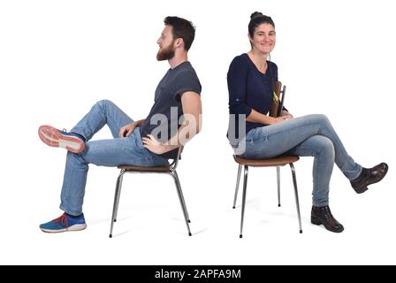 couple sitting in a vintage chair isolated on white Stock Photo