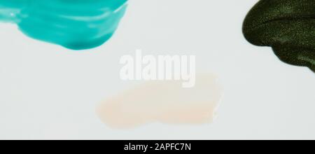 Clear brown paint stroke isolated on white background close up view Stock Photo