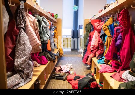 Hamburg, Germany. 13th Dec, 2019. View over the cloakroom with jackets, caps and other clothes in a kindergarten. Credit: Christian Charisius/dpa/Alamy Live News Stock Photo