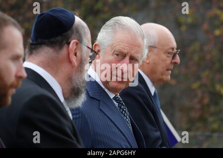 The Prince of Wales (second right) speaks with the Chairman of the Board of Directors of the Israel Museum Isaac Molho, (right), and Chief Rabbi Ephraim Mirvis, (second left), as he walks to visit a rebuilt synagogue in Jerusalem on the first day of his visit to Israel and the occupied Palestinian territories. Stock Photo