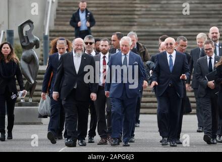 The Prince of Wales (centre) speaks with the Chairman of the Board of Directors of the Israel Museum Isaac Molho, (centre right), and Chief Rabbi Ephraim Mirvis, (centre left), as he walks to visit a rebuilt synagogue in Jerusalem on the first day of his visit to Israel and the occupied Palestinian territories. Stock Photo