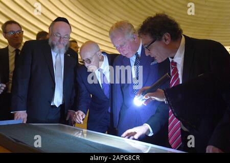 The Prince of Wales (second right) Chief Rabbi Ephraim Mirvis (second left) and Chairman of the Board of Directors of the Israel Museum Isaac Molho (third right) look at the Dead Sea Scrolls, during a visit to the Shrine of the Book at the Israel Museum in Jerusalem on the first day of his visit to Israel and the occupied Palestinian territories. Stock Photo