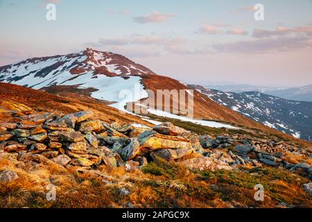 Fantastic sunny day is in mountain landscape. Dramatic and picturesque morning scene. Place location Carpathian National park, Chornogora ridge.