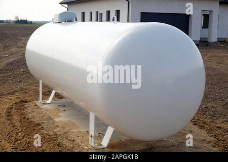 A source of clean energy. Gas tank for heating the house. Stock Photo