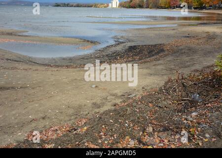 Patterns on sandy beach and leaves in fall Stock Photo