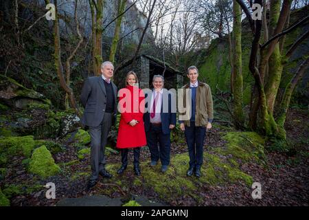 EMBARGOED TO 0001 FRIDAY JANUARY 24 (Left to right) Dr David Gwyn (historian, Heritage Minister Helen Whatley, Cllr Gareth Thomas and UK Welsh Minister David Davies at the Welsh Slate Museum in Llanberis, to mark the news that the slate mining landscape of northwest Wales could be the UK???s next UNESCO World Heritage site. Stock Photo