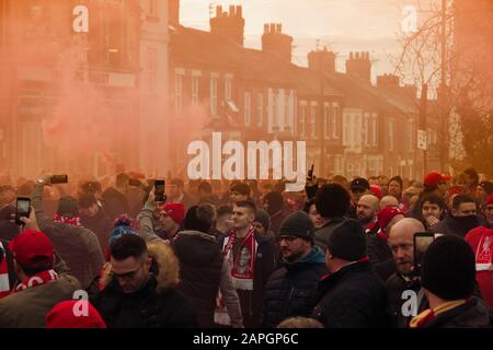 Liverpool supporters give the team coach a fantastic reception as they arrive for the Premier League match against Manchester  United  at Anfield. Stock Photo