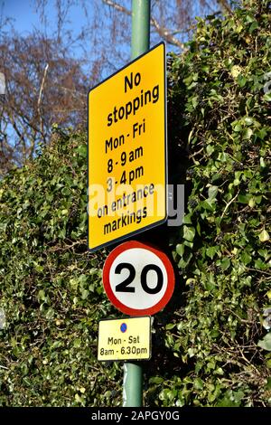 Maidstone, Kent, UK. Street signs: 20mph no stopping zone (near two schools)