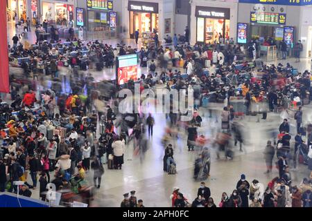 Chinese passengers crowd Shanghai Hongqiao Railway Station during the Spring Festival travel rush ahead of the Chinese New Year in Shanghai, China on Stock Photo