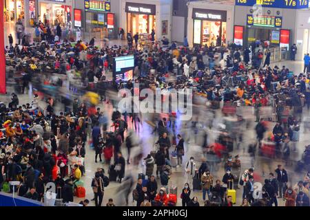 Chinese passengers crowd Shanghai Hongqiao Railway Station during the Spring Festival travel rush ahead of the Chinese New Year in Shanghai, China on Stock Photo