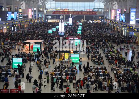 Chinese passengers crowd Shanghai Hongqiao Railway Station during the Spring Festival travel rush ahead of the Chinese New Year in Shanghai, China on Stock Photo