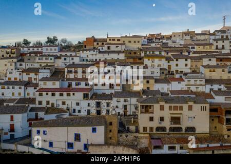 Colorful houses with square windows and traditional roofs in Alcala del Jucar Spain Stock Photo