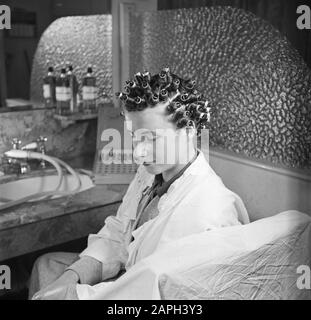 women's hair salons, customers, barberchairs, perms, curlers, EFA-Lock Date: November 1950 Keywords: women's hair salons, barberchairs, customers, curlers, perm person name: EFA- Lock Stock Photo