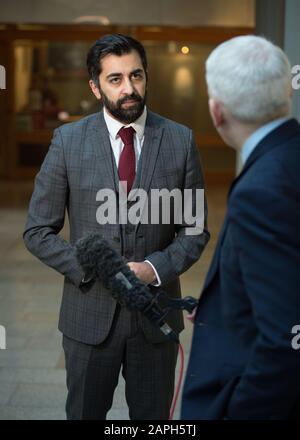 Edinburgh, UK. 23 January 2020.   Pictured: Humza Yousaf MSP - Cabinet Secretary for Justice of the Scottish National Party (SNP), seen during a live television interview in the Scottish Parliament. Credit: Colin Fisher/Alamy Live News Stock Photo