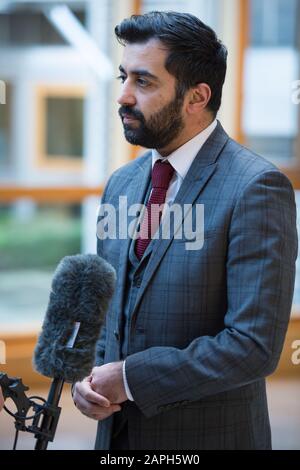 Edinburgh, UK. 23 January 2020.   Pictured: Humza Yousaf MSP - Cabinet Secretary for Justice of the Scottish National Party (SNP), seen during a live television interview in the Scottish Parliament. Credit: Colin Fisher/Alamy Live News Stock Photo