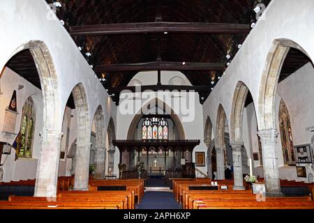 View east along nave towards choir and chancel inside St Mildreds church , Tenterden , Kent , England Stock Photo