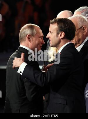 Jerusalem, Israel. 23rd Jan, 2020. Russian President Vladimir Putin (L) talks with French President Emmanuel Macron (R) during the Fifth World Holocaust Forum at the Yad Vashem Holocaust memorial museum in Jerusalem, Israel, on Thursday, January 23, 2020. World leaders are marking the 75th anniversary of the liberation of the Nazi extermination camp Auschwitz. Pool Photo by Abir Sultan/UPI Credit: UPI/Alamy Live News