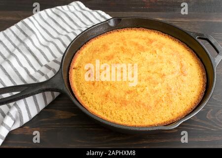 Southern Buttermilk Cornbread: Traditional Southern cornbread baked in a cast-iron skillet Stock Photo