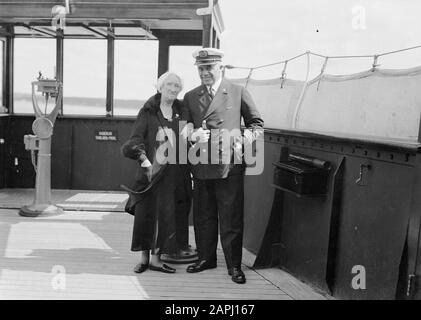 Sea voyage with MS Johan van Oldenbarnevelt to Norway Description: The actor Esther de Boer-van Rijk and Captain Julsing on the bridge Annotation: The actor Esther de Boer-van Rijk became known by her role as Kneertje in Herman Heijermans' play On hope of blessing Date: 1933 Location: Norway Keywords: actors, bridges, cruises, cruise ships, headgear, captains, passenger ships, travelers, ships, tourism, uniforms, women, sailors Personal name: Boer-van Rijk, Esther de , Heijermans, Herman, Julsing, [...] Stock Photo