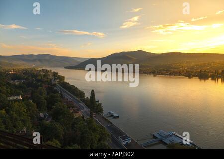 Amazing view of the Danube from the observation tower of Solomon in the Vysehrad fortress, Hungary. Sunset with water reflection. Top angle view Stock Photo