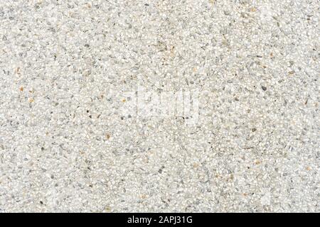Gravel stone wall texture. Small gravel wall Mix with white, black gray stone to make a wall. Stock Photo