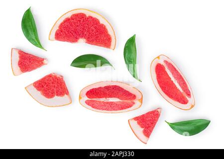 Grapefruit and slices with leaves isolated on white background. Top view. Flat lay pattern Stock Photo