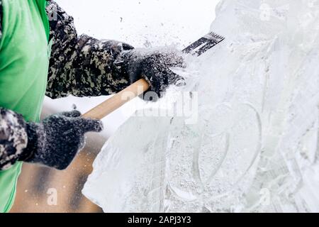 Ice Chisel Winter Ice sculpture carving man use chisel cut frozen winter Stock Photo - Alamy