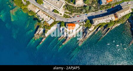 Rocky bay in Italy. Aerial drone view on Adriatic sea beach, Camogli, liguria. Stock Photo