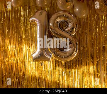 eightenn number made from gold baloons for a decoration for a birthday Stock Photo