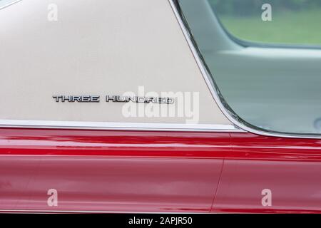 Close up detail of the side of a 60's vintage red Chrysler 300 Stock Photo