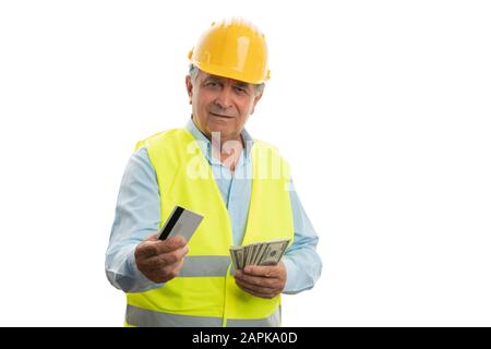 Old smiling male architect presenting card and dollar bills with friendly expression isolated on white background Stock Photo